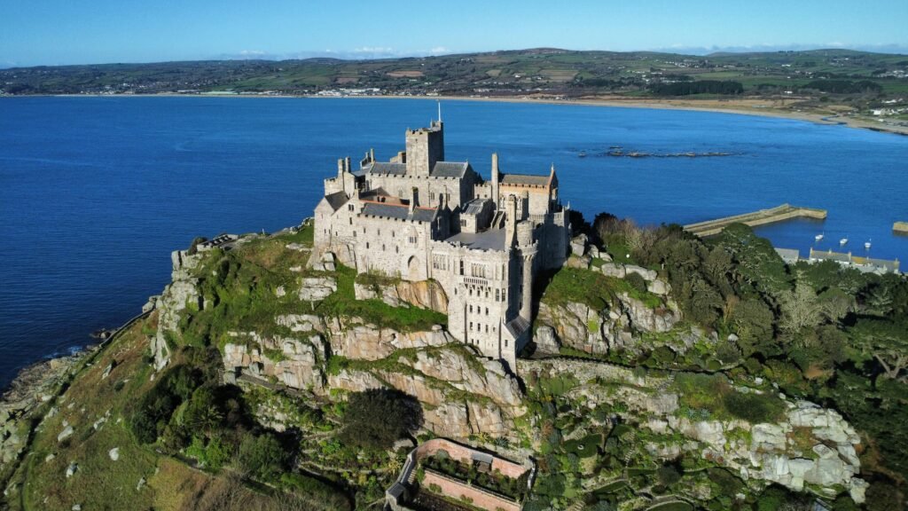 Stunning aerial view of St Michael's Mount castle and the coast.